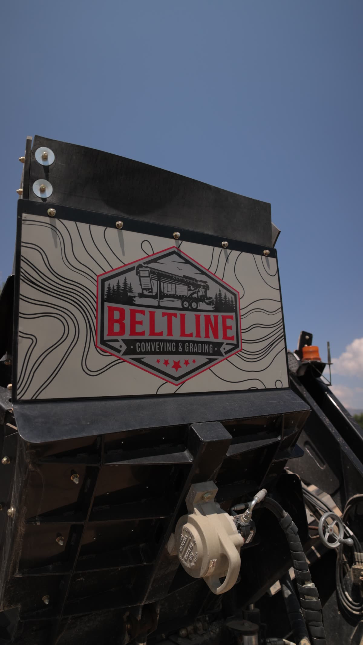 Beltline badge on the Stout TC-50 hopper